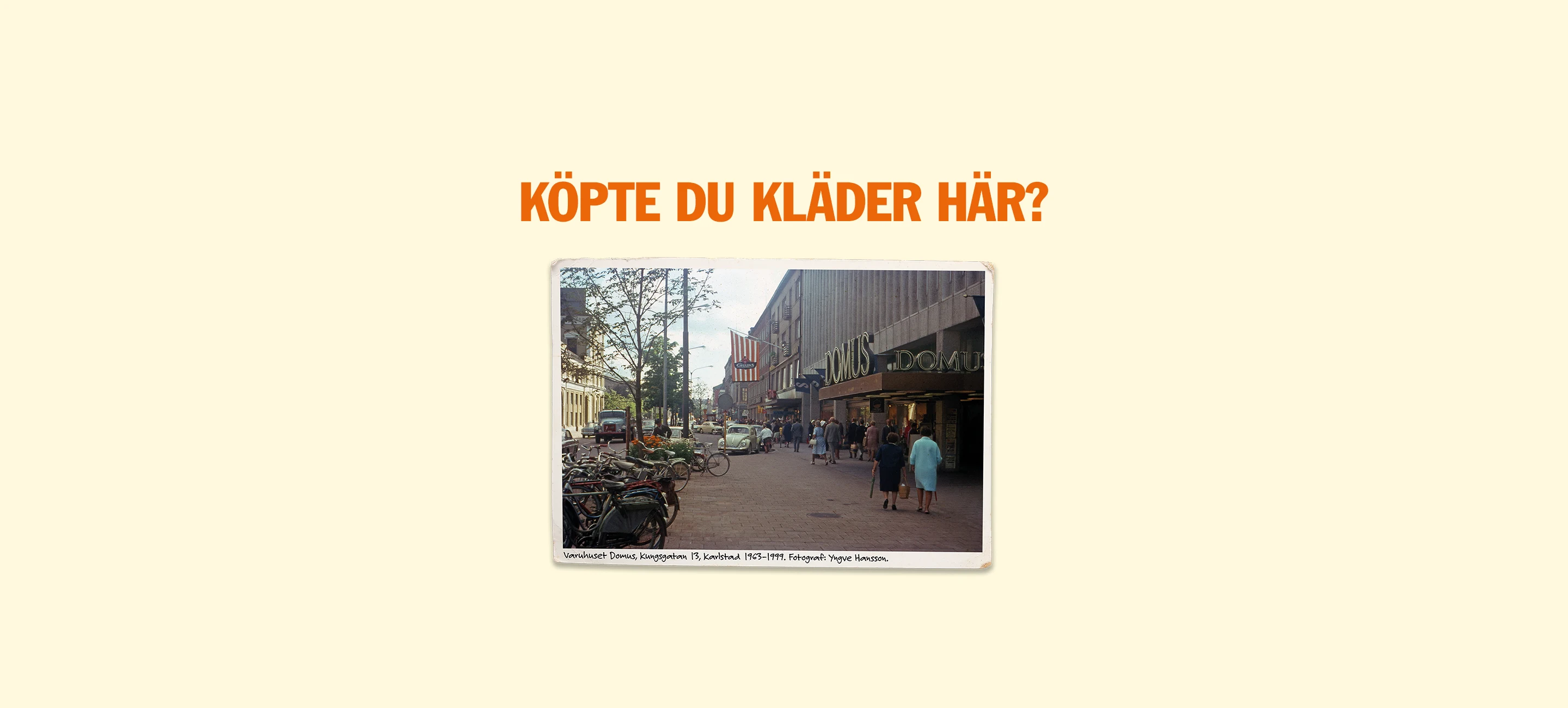 Fotografi av Varuhuset Domus, Kungsgatan 13, Karlstad 1963-1999. Fotograf: Yngve Hansson. Text på bild: Köpte du kläder här?