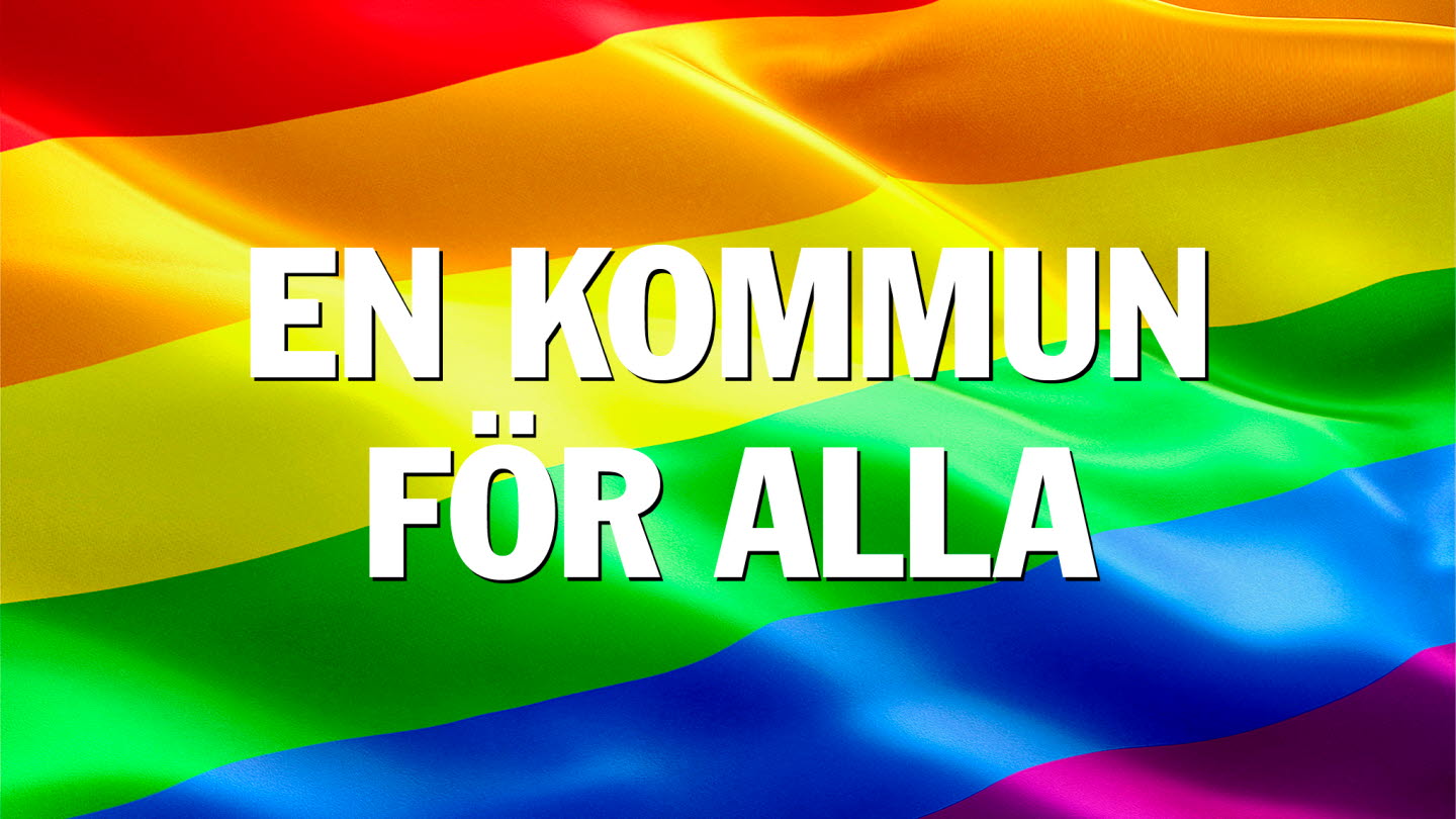 Prideflagga med texten En kommun för alla